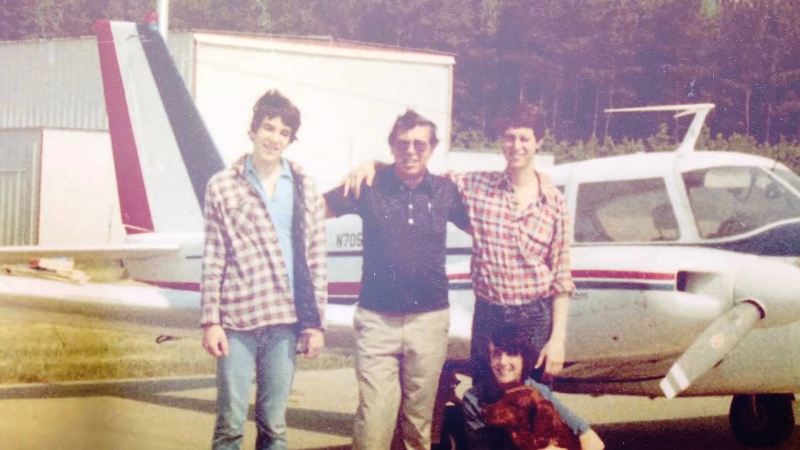 Mark Hyman (right) in his teens with his father and siblings
